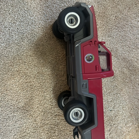 Red truck for horses it does have a broken door but still works. - Picture 2 of 6